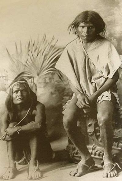 An Old Photo Of Two Native American Men