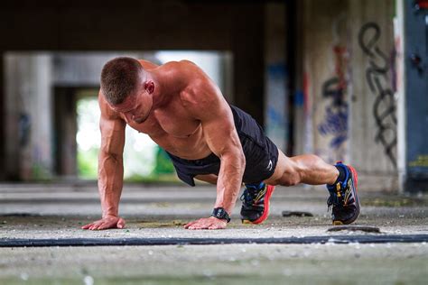 Shirtless Muscular Man Doing Push Ups · Free Stock Photo