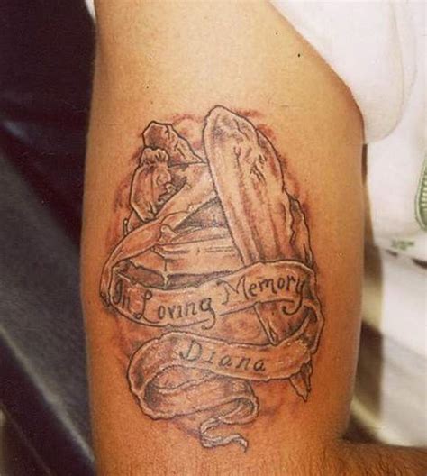 It consists of the image of a man dressed in a cap and kneeling down. 50 Impressive Memorial Tattoos Designs - Best Tattoos ...