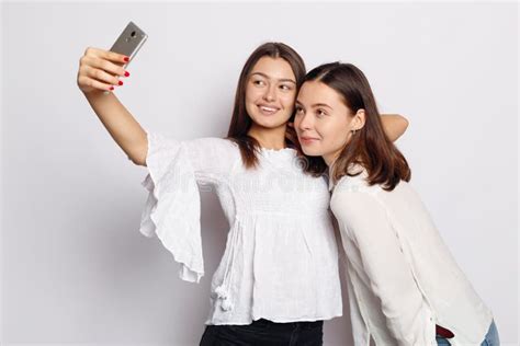 Beautiful Girlfriends Taking A Self Shot With Phone Stock Image Image