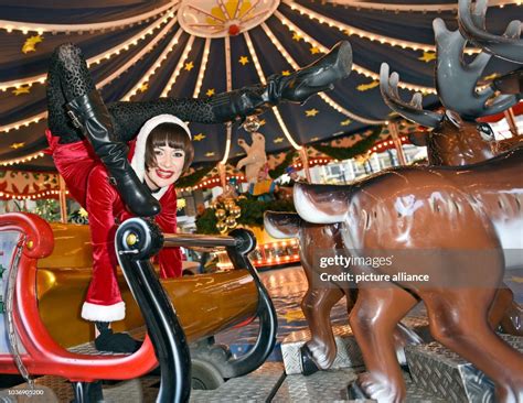 Contortionist Alina Ruppel Pictured On A Carrousel At The Christmas News Photo Getty Images