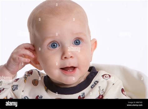 Baby Boy Rubbing His Ear From Sleep Stock Photo Alamy