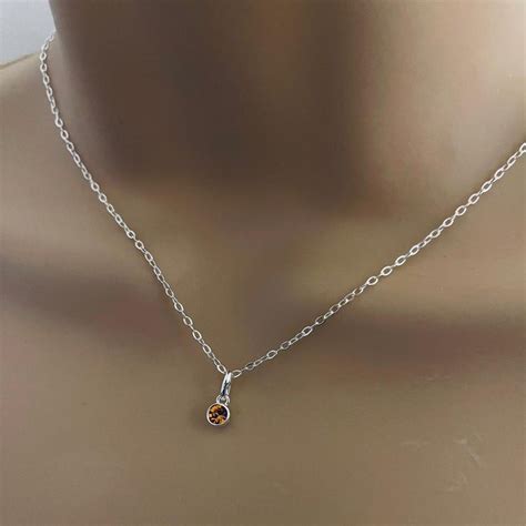 This Necklace Features A Sterling Silver Mm Birthstone Charm