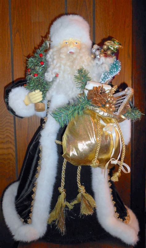 20 best images about Christmas Tree Topper Ideas on ... Feathery wings add a soft touch.