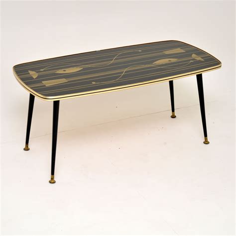 Vintage baughman mid century brass cocktail coffee table atomic gold mastercraft. 1950's Vintage Atomic Style Coffee Table - Retrospective ...