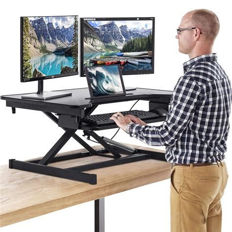Customize your workstation to your exact needs! FDW Adjustable Height 32 Inches Steel Standing Desk ...