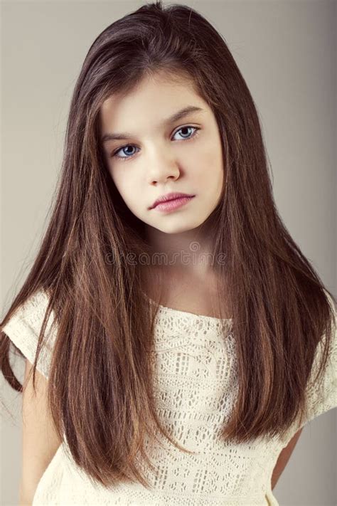 Portrait Of A Charming Brunette Little Girl Stock Photo Image Of