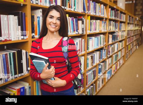 Portrait Of Student Holding Books Stock Photo Alamy