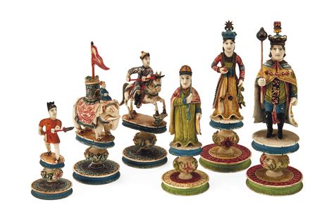 A Chinese Export Polychrome Decorated Ivory Figural Chess Set