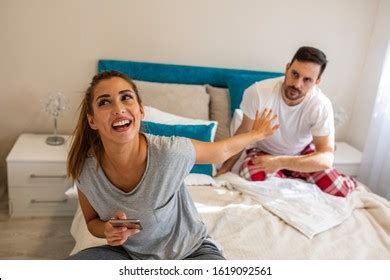Jealous Gossip Husband Watching His Wife Stock Photo 1619092174