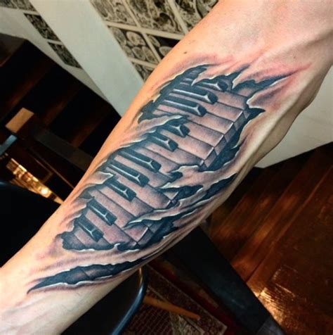 Stylish piano keys tattoo on chest nice small piano keys tattoo on finger realistic black and white piano keys with radio tattoo on sleev piano tattoo | Piano tattoo, Music tattoo designs, Music tattoos