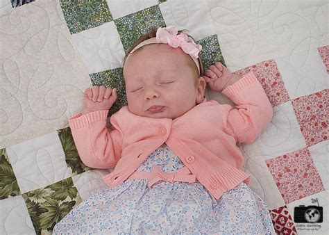 newborn on quilt little earthling photography