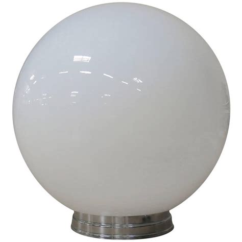 Maybe you would like to learn more about one of these? 1930s Ceiling Light Fixture with Milk Glass Globe at 1stdibs