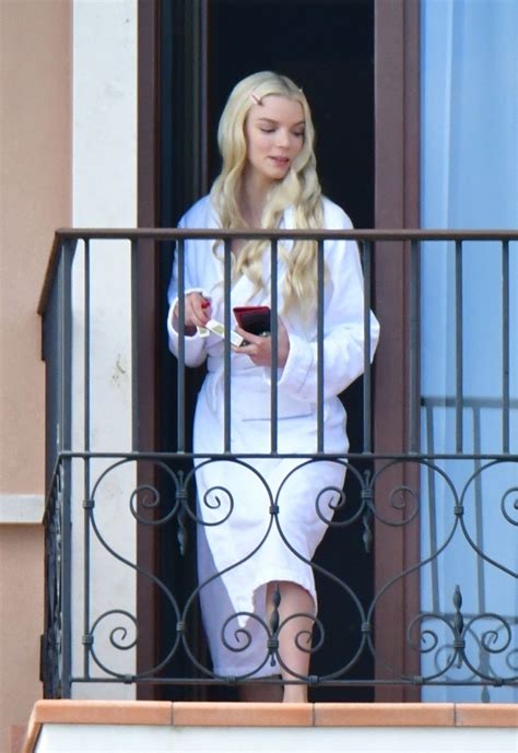 Anya Taylor Joy Enjoys A Cigarette On Her Hotel Balcony In Venice 09042021 Hawtcelebs