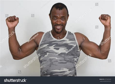 African Man Flexing Biceps Stock Photo 377422243 Shutterstock