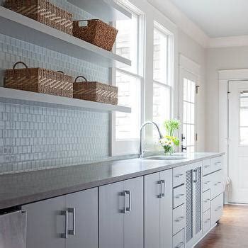 Head to salvage specialists like retrouvius for reclaimed science benches and haberdashery displays. Overhead Kitchen Cabinets Design Ideas