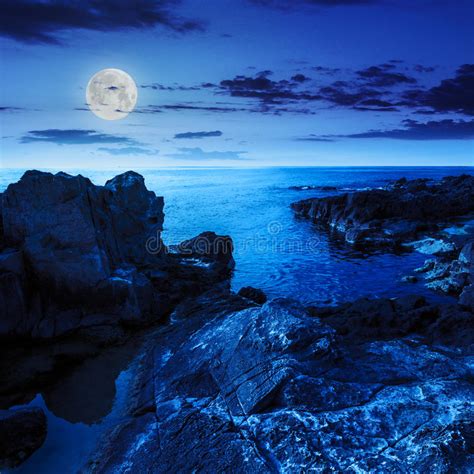 Calm Sea Wave Touches Boulders At Night Stock Image Image Of Coast