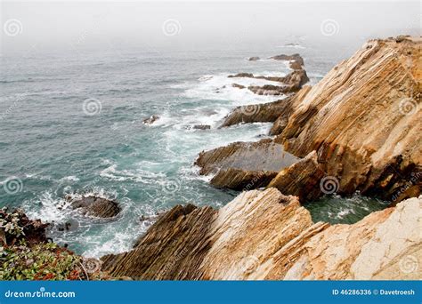 Waves On A Foggy Calif Coastline Stock Photo Image Of Cliff Misty