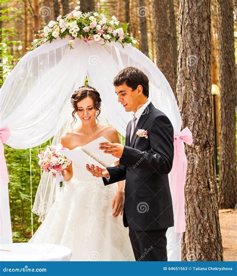 Couple Getting Married At An Outdoor Wedding Stock Image Image Of Happy Outdoor 64651563