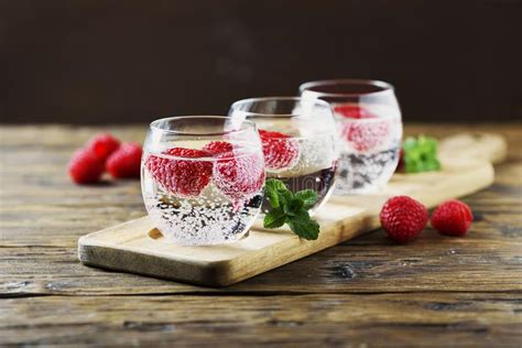 Summer Soda With Lemon And Berries In Glass Jar Stock Photo Image Of
