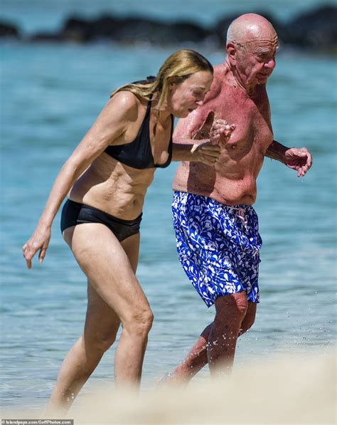 Jerry Hall Wows In Skimpy Black Bikini As She Enjoys Beach Stroll