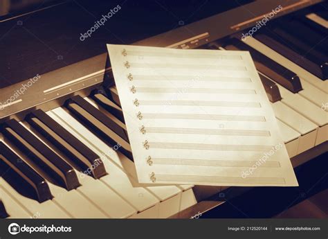Music Notes Piano Keys Stock Photo By ©fotofabrika 212520144