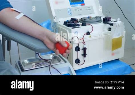 A Donor Undergoes A Blood Transfusion While Donating In A Special