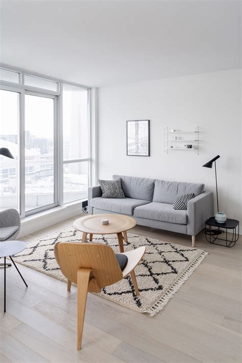 The living room is the center of your home. Condo living room tour: a bright, minimalist space | Happy ...