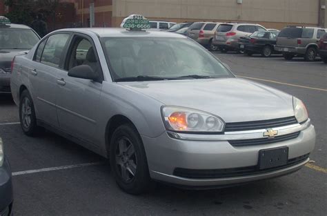 Glass dressing table, dmx lighting effect, and betty boop shower curtain. 2005 Chevrolet Malibu LT - Sedan 3.5L V6 auto