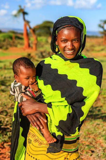 Woman From Borana Tribe Carrying Her Baby The Borana Oromo Are A