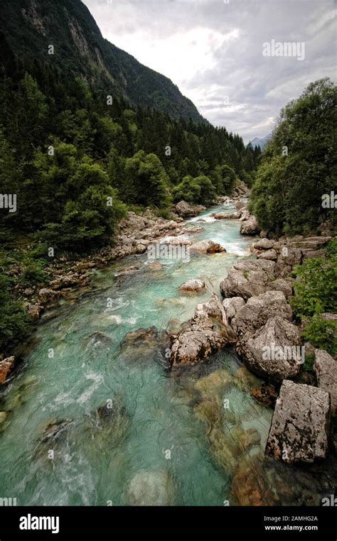 Emerald Green River Soca In Slovenia Alpine Mountain River Stock Photo