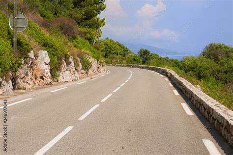 Typical French Road Corniche Between Nice And Monaco With Ocean In