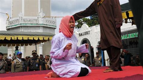 Woman Publicly Caned In Indonesia For Being In “close Proximity” To A Man Who Was Not Her Spouse