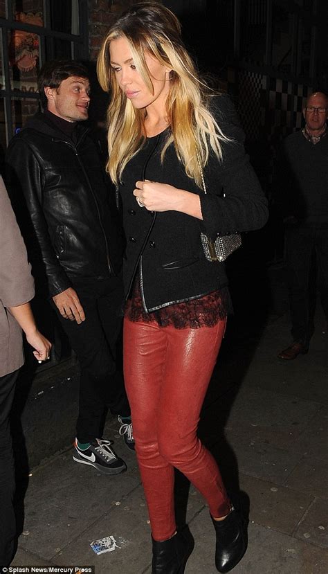 Abbey Crouch Shows Off Her Trim Pins In Skintight Red Leather Trousers