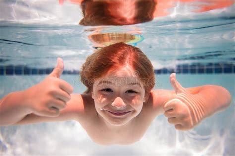 Funny Kids Face Under Water Young Boy Swim And Dive Underwater Summer