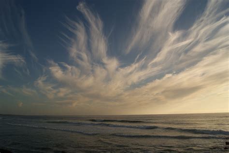 Безплатна снимка плаж пейзаж море крайбрежие пясък океан хоризонт облак небе слънце