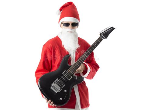 Christmas Male Guitarist With A Black Electric Guitar Stock Photo