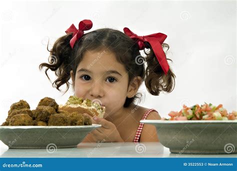 Girl Eating Pork Fried Rice In Restaurant Royalty Free Stock Image