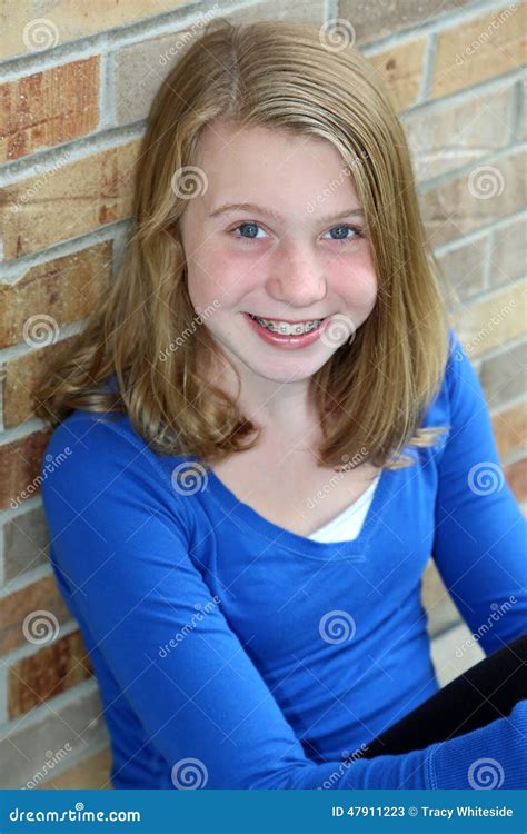 Smiling Blonde Girl With Blue Eyes Stock Photo Image 47911223
