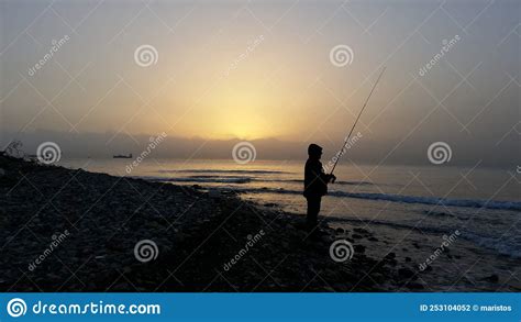 The Fisherman At Sunrise On The Sea Stock Photo Image Of Cyprus