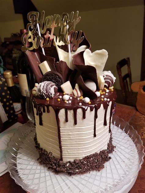 Homemade Chocolate Cake Frosted With Vanilla Swiss Meringue Buttercream Topped With Chocolate