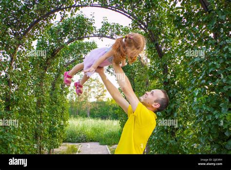 Dad And Daughter Are Dancing In Naturea Little Ballerina Dances With Her Dad Little Princess