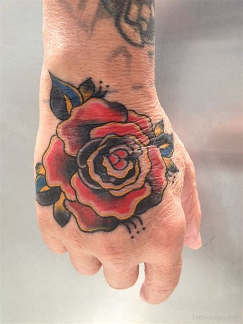 Nice Rose Tattoo On Hand Tattoo Designs Tattoo Pictures