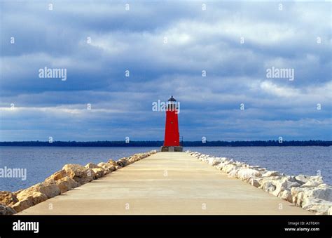 The Manistique Lighthouse And Breakwater At The Mouth Of The Manistique