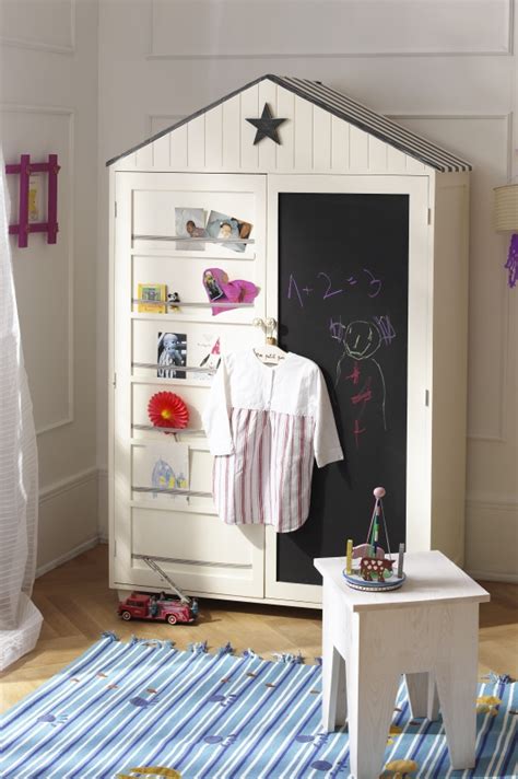 This kids wardrobe design is simple in nature in white in a minimalistic styled room. Kids room cupboard designs - Video and Photos ...