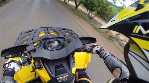 Shooting a slingshot at cans,bottlecaps,acorns,leaves etc. Can am outlander 650 Max XT top speed - YouTube