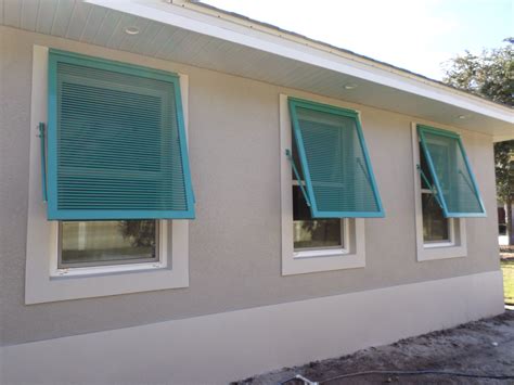 Bahama Shutters In Teal Liven Up This Sarasota Home Bahama Shutters