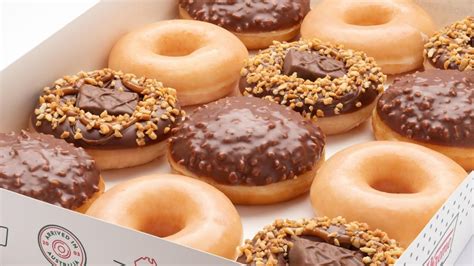 Krispy Kreme Collaborates With Snickers To Release New Doughnuts The