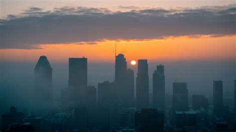 Download Wallpaper 3840x2160 City Aerial View Sun Sunset Fog 4k Uhd