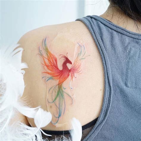Watercolor Phoenix Tattoo On The Shoulder Blade